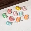 Acessórios de resina transparentes de cor única com 26 letras do alfabeto inglês para embellishments de capa de celular com cola de creme artesanal DIY