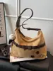 Moda de moda Versátil Gran capacidad Bolso de hombro Bolsos de alta gama Bolso de mano para el trabajo Bolso cruzado único de nicho elegante
