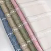 Suministro directo de fábrica al por mayor con diseño de cruz hueca cortina para sofá cojín para sofá mantel tela de poliéster simple y fresco