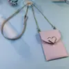 2022 nueva hebilla de amor cartera cruzada diagonal bolsa para teléfono móvil paquete de tarjetas de autobús INS Red social bolsa para carcasa de teléfono