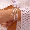 Collar con colgante de estrella de mar irregular casual nuevo 2025, viento marino, concha, cuentas de arroz, pulsera, tobillera, juego