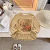 Top de lunares vintage para niña 2026 Otoño Nuevo Estilo Infantil Bebé Niña Dibujos Animados Lunares Camiseta de Moda Tendencia