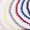 Venta al por mayor del fabricante Pestaña de botón elástica colorida Ropa para vestido Banda elástica en la parte posterior del cuello Hebilla de encaje Hebilla de collar de sombrero extraíble