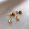 Pendientes de Trébol de Cuatro Hojas Maillard de Aguja de Plata Estilo Hong Kong Retro Elegantes Pendientes para el Trabajo Moda Femenina Lujo Ligero Pendientes de Gama Alta