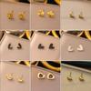 Aretes de acero de titanio aretes de alta gama nicho temperamento Perla aretes de borla de flor encantadores joyería versátil para mujer venta al por mayor
