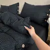 Popular conjunto de cuatro piezas de gasa fruncida de algodón lavado a rayas, conjunto de tres piezas para dormitorio estudiantil, sábana bajera, estilo japonés suave y sencillo