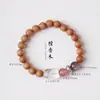 Nueva joyería de pulsera de sándalo estilo chino, cristal de fresa, sándalo verde, sándalo dorado, palo de rosa de hoja pequeña, cuentas de oración budistas, hecho a mano