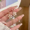 Brincos de Franja Flor de Cerejeira da Primavera para Mulheres Agulha de Prata Novo Design de Nicho Senso de Design Coração de Menina Doce Elegante Brincos