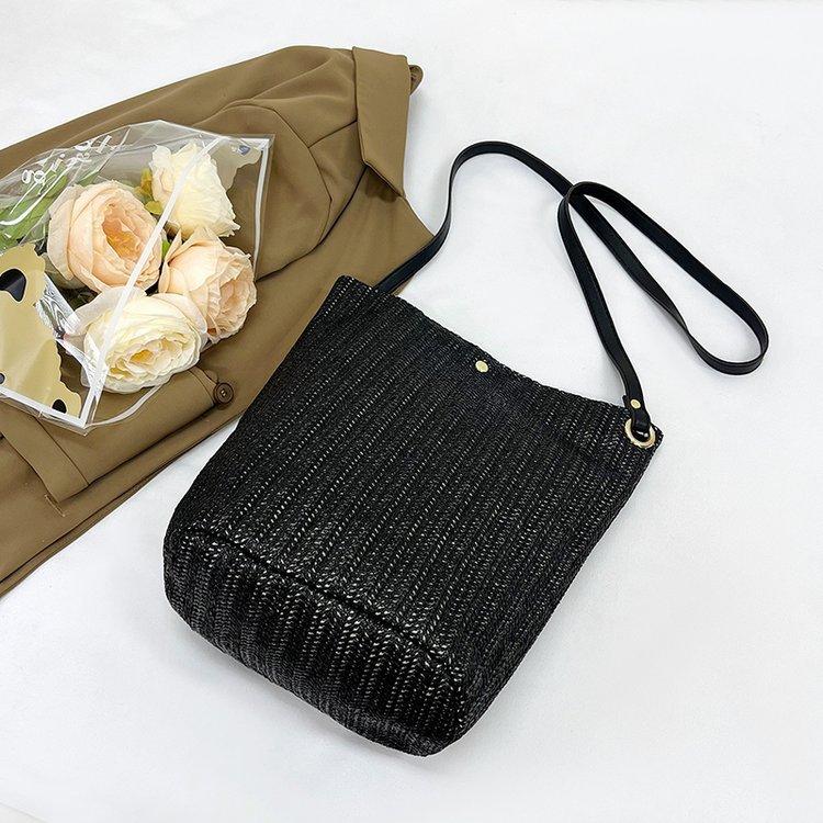 编织包女包新款潮2024夏草编简约百搭小清新水桶包个性单肩斜
