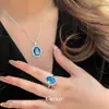 Collar con colgante ovalado de circón azul claro tono océano para mujer, cadena para la clavícula dulce y elegante con un toque de alta gama