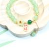 Pulsera de transferencia de flor de melocotón para niñas, cuentas redondas de cristal rosa flor de melocotón, exquisita pulsera de jade hetian de imitación, regalo de cumpleaños.