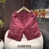 Pantalones cortos populares para hombre color vino tinto, diseño de líneas simples, nuevos pantalones cortos transpirables de verano para deportes al aire libre.