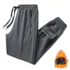 Calça de moletom masculina transfronteiriça, nova para outono e inverno, corte solto, plus size, forrada com fleece, perna reta, cor sólida, elástica, espessa, calça casual para jovens