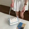 Bolsa de Mão Quadrada Pequena Versátil Única para Mulheres, Novo Modelo Primavera 2026, Bolsa de Ombro Transversal Estilosa de Desenho Animado de Alta Qualidade