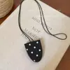 Collar con clip para gafas de cuero de lunares de lujo ligero estilo francés, cadena para suéter única y exquisita, accesorio simple y elegante para mujer