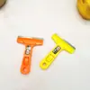 Pala de limpieza al por mayor para suelo para quitar suciedad de vidrio de pared pala de limpieza portátil nueva cuchillo mango de color paleta