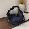 2026 Nova Bolsa Feminina de Ombro Único Estilo Coreano Bolsa de Trabalho de Nicho Bolsa Transversal Pequena Estilosa Bolsa de Bolinho de Massa Artística de Alta Estética