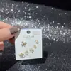 Nuevo Conjunto de Aretes de Múltiples Piezas, Aretes de Mariposa, Circonita Súper Brillante, Galvanizado Ecológico, Aguja de Plata S925, Moda de Invierno