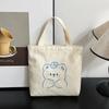 Bolso de hombro con estampado de oso jk mochila de mano caricatura estudiante bolsa de lona al por mayor simple bolsa de gran capacidad mujeres