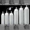 Paquete de 5 botellas exprimibles de plástico extra grandes, engrosadas y de grado alimenticio para salsas y condimentos, con boquilla de presión, adecuadas para uso comercial y venta ambulante, ideales para salsa de ostras