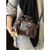 Bolsas femininas estilo coreano com textura de alta qualidade, bolsas de ombro de design nicho, bolsas quadradas pequenas casuais da moda atacado