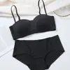 Top de tubo de media copa Sujetador brillante Ropa interior sin costuras para mujer Delgado Sin aros Tirantes desmontables Taza A Fabricante de sujetadores para mujer Venta al por mayor