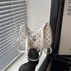 Bolsa de bolinhas feminina 2026 nova tendência verão bolsa de ombro única para o dia a dia bolsa de axila design de nicho estiloso bolsa de ombro único