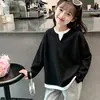 Nuevo de moda para niñas, elegante, manga larga, capa base infantil, imitación de dos piezas, tejido gofrado, camiseta casual, versátil, moderno
