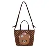 Bolso de hombro infantil estilo caricatura japonés y coreano, bolso de mano de lunares, bolsa de asas de gran capacidad, bolso de mano transfronterizo 2026