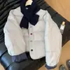 Estilo bufanda coreano nuevo estilo suave azul leche chaqueta de algodón 2025 otoño e invierno versátil holgada color contrastante corta chaqueta de algodón