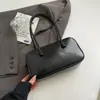 Bolso de mano retro para mujer 2026 nuevo de alta gama para el hombro gran capacidad tipo tote para el día a día bolso de hombro casual moderno