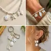 Perla de Imitación ABS Blanco Crudo Lazo Cruzado Estrella de Cinco Puntas Pulsera Hecha a Mano DIY Pendientes Accesorios de Joyería con Cuentas