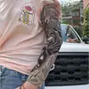 Mangas de tatuaje al por mayor transfronterizas Mangas de brazo de flores Tatuaje Mangas para hombres y mujeres Verano Ciclismo y conducción Protección solar Mangas de brazo Mangas de mano