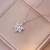 Collar para Mujer Moda Nicho Nuevo Diseño Colgante Celebridad de Internet Flor de Zircón Bauhinia Giratoria Temperamento Collar de Acero Titanio