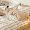 Nuevo modelo primavera y verano todo algodón estampado gofrado simple juego de casa de cuatro piezas dormitorio de estudiante tipo todo estación juego de tres piezas A 4