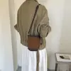 Bolso de mano retro de gamuza para mujer para otoño e invierno, nuevo bolso tipo cubo elegante y versátil 2026, bolso cruzado casual de nicho para el día a día