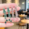 Nuevos Pendientes Largos de Lujo Ligero con Sentido de Alta Gama Temperamento Elegante Diseño de Nicho Orejeras de Moda Nudo Colgante de Pendiente de Gota de Agua