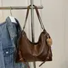 Mochila elegante y versátil para mujer, nueva colección 2026, bolso de hombro, bolso cruzado, diseño de alta gama, gran capacidad, bolso tote retro