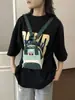 Colección de otoño 2026 transfronteriza: una mochila linda con estampado de dibujos animados, patchwork y bloques de color que se puede llevar como bolso de hombro o como mochila