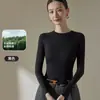 Nueva camisa básica cálida de Lyocell de corte ajustado para mujer de otoño e invierno, top de otoño simple de color liso de manga larga, se puede usar como prenda exterior