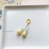 Precio mayorista directo de fábrica pulsera hecha a mano pulsera con colgante diy accesorios pequeños deslizantes colgante de garra de gato lindo Joker