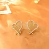 Pendientes Europeos y Americanos de Corazón Hueco Tejido Transfronterizos, Románticos, Dulces, Modernos, Pendientes de Alta Gama, Accesorios de Moda