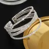 Pulsera ancha de alambre de acero con pedrería estilo europeo y americano, multicapa, apertura cruzada, elástica, brillante, exagerada, grande, al por mayor B311