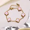 Acero de Titanio Chapado en Oro Transfronterizo Más Vendido Acero Inoxidable Pulsera, Collar, Anillo y Pendientes de Trébol de Cuatro Hojas Conjunto Fábrica al por Mayor