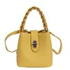 Bolso tipo cubo de diseño nicho nuevo de primavera, moderno, casual, único, bandolera cruzada de hombro de moda para mujer 2026