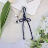 Nudo de Corazón Creativo Nuevo Estilo Miu Lanyard Versátil Llavero Colgante para Bolsas y Fundas de Teléfono