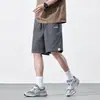 Pantalones cortos de algodón puro para hombre, nuevo estilo de verano 2026, pantalones casuales holgados de longitud media, pantalones de 5 puntos color caqui de alta gama