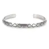 2023 Pulsera tejida retorcida abierta retro europea y americana Pulsera chapada en cobre y plata Pulsera geométrica para hombre venta al por mayor
