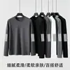 Camiseta de manga larga para hombre para primavera y otoño, top holgado de cuello redondo, camisa fina para capas de otoño, camiseta base elástica para hombre, versátil y moderna