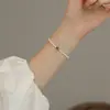 Pulsera emocionalmente estable, pulsera de perlas Shijia para mujer, nuevo estilo de moda 2025, pulsera apilable de lujo accesible de estilo nacional